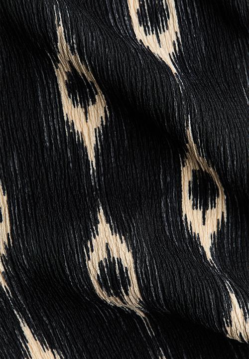 H&M - Wide gathered-waist trousers - black/patterned