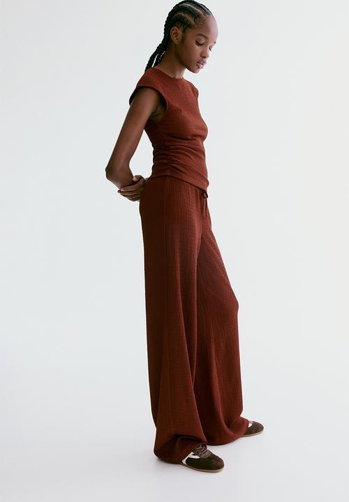 H&M - Textured jersey trousers - rust brown