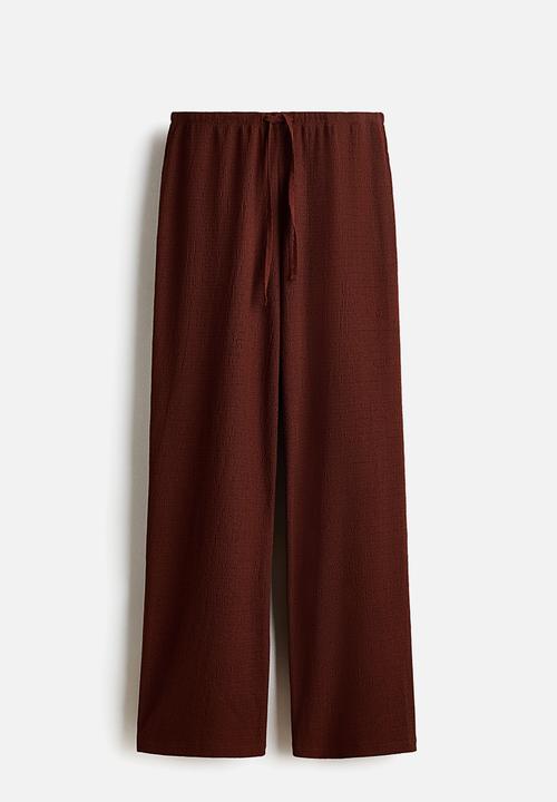 H&M - Textured jersey trousers - rust brown