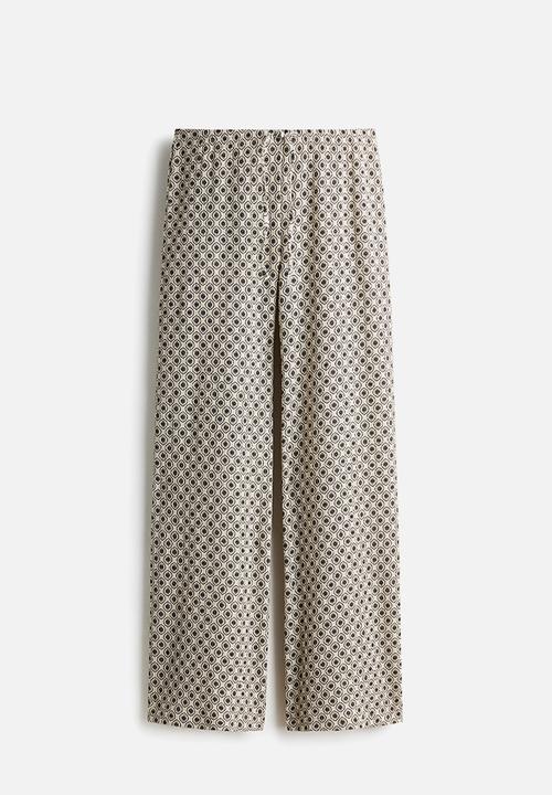 H&M - Textured jersey trousers - light beige/patterned