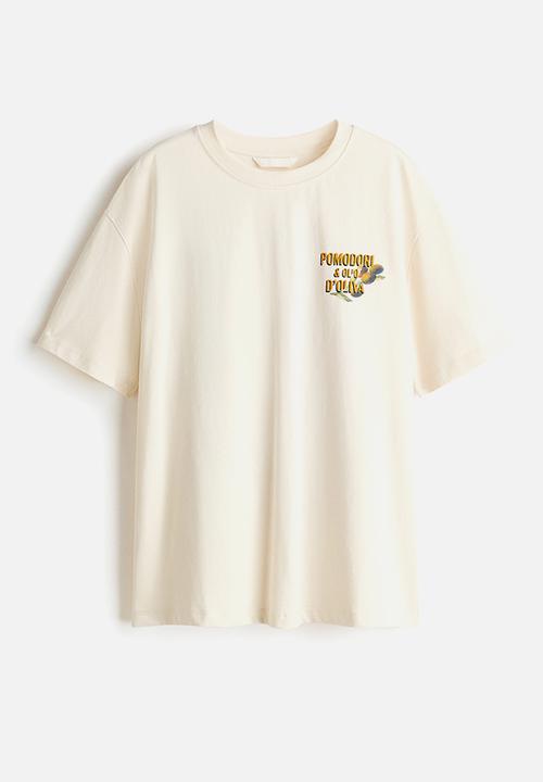 H&M - Oversized printed t-shirt - cream/pomodori