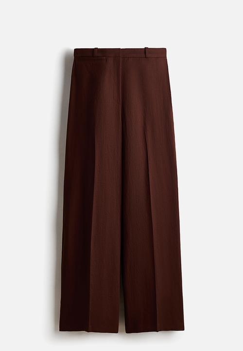 H&M - Wide tailored trousers - dark rust brown
