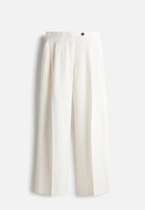 H&M - Wide tailored trousers - ivory