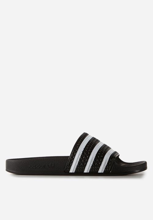 black and white adidas flip flops