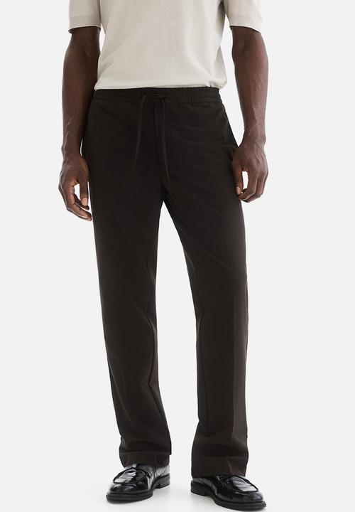 H&M - Slim fit tailored joggers - dark brown