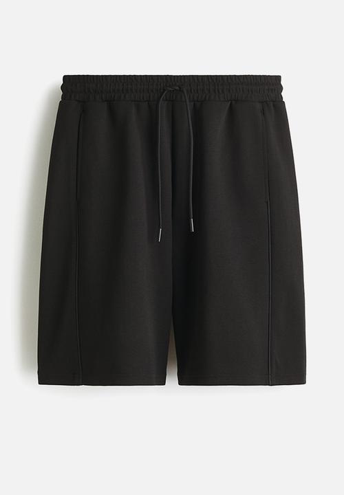H&M - Loose fit sports shorts with drymove™ - black