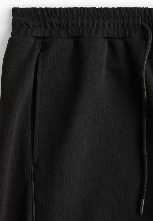 H&M - Loose fit sports shorts with drymove™ - black