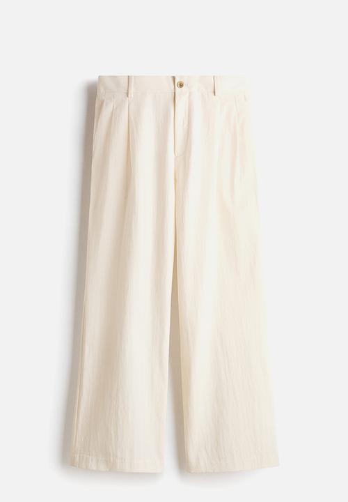 H&M - Loose fit wide trousers - cream