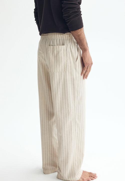 H&M - Relaxed fit linen-blend trousers - beige/striped