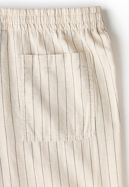 H&M - Relaxed fit linen-blend trousers - beige/striped