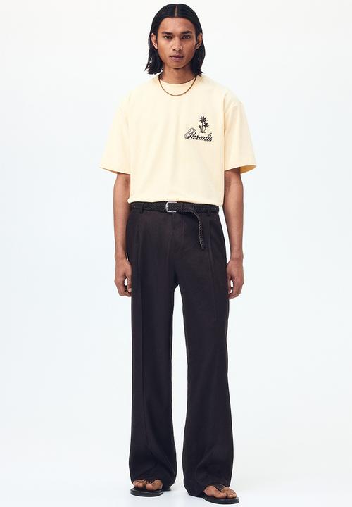 H&M - Relaxed fit printed cotton T-shirt - light yellow/paradis