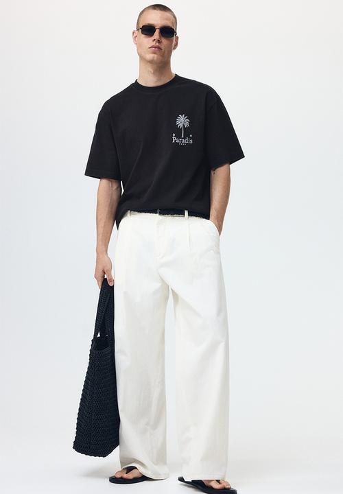 H&M - Relaxed fit printed cotton T-shirt - black/paradis