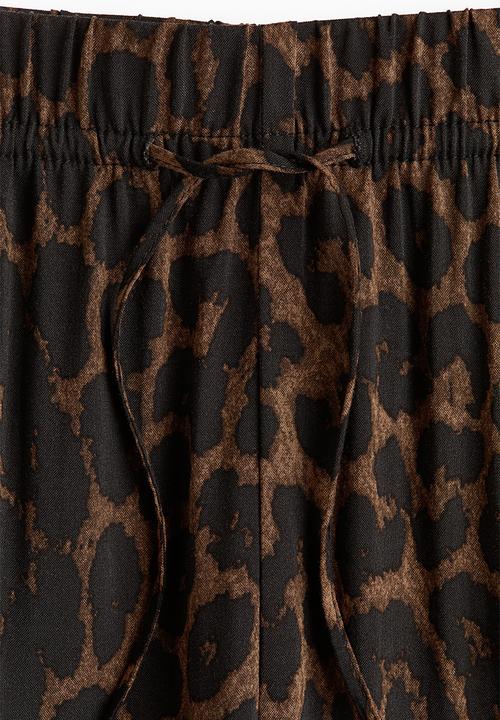 H&M - Wide pull-on trousers - dark beige/leopard print