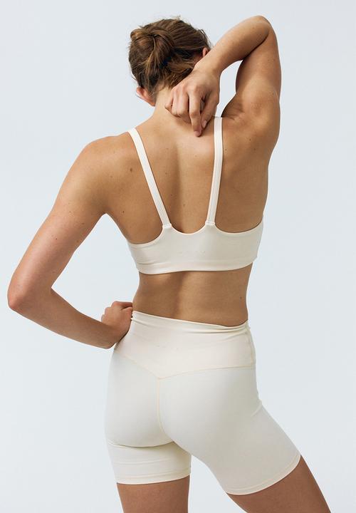 H&M - Sports cycling shorts with softmove? - butter yellow