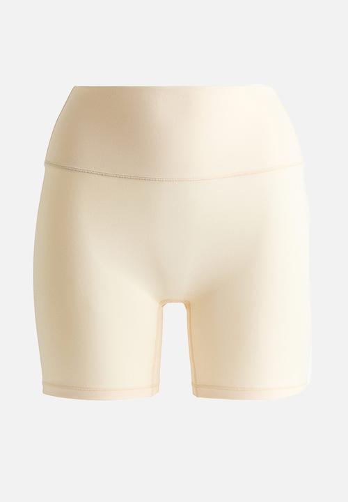 H&M - Sports cycling shorts with softmove? - butter yellow