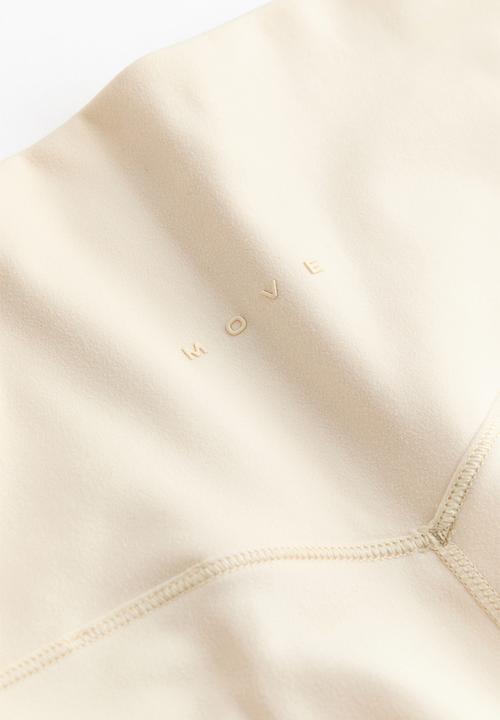 H&M - Sports cycling shorts with softmove? - butter yellow