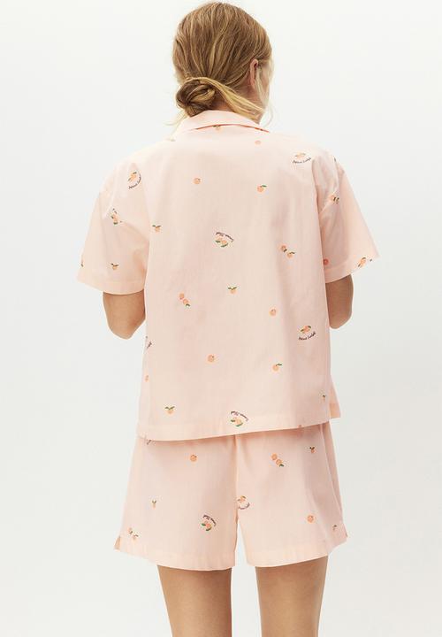 H&M - Pyjama shirt and shorts - light peach pink/apricots
