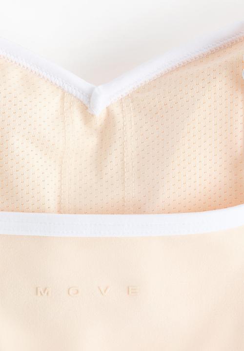 H&M - Medium support sports bra with softmove? - butter yellow