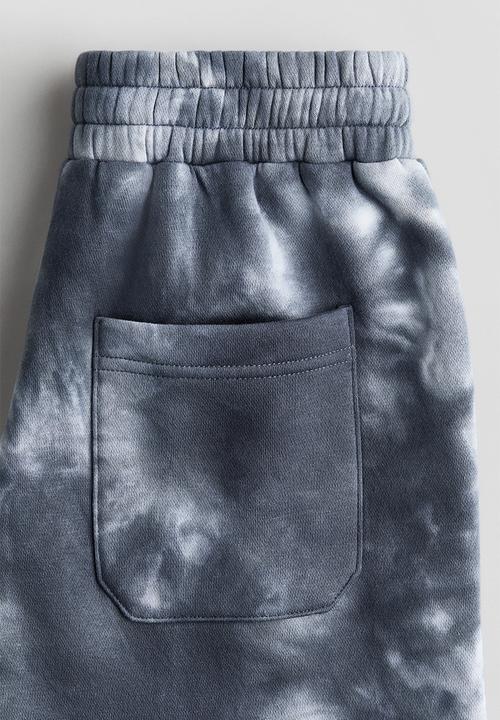 H&M - Printed sweatshorts - dark grey/tie-dye