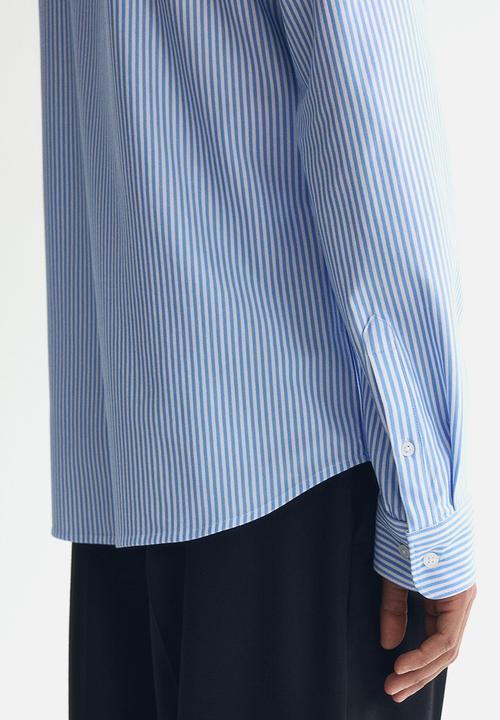 H&M - Four-way stretch slim fit shirt - light blue/striped