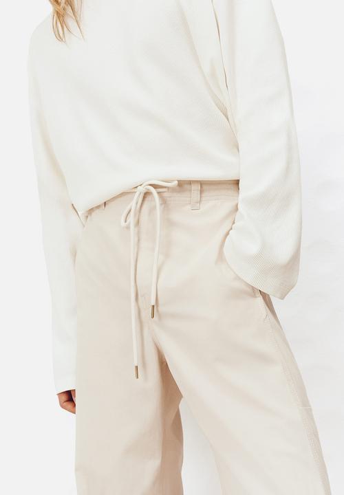 H&M - Loose fit cargo trousers - light beige