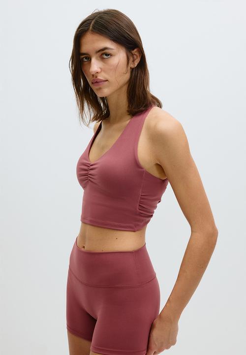 H&M - Sports hotpants with softmove™ - light maroon