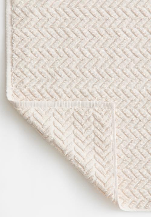 H&M - Textured bath mat - cream