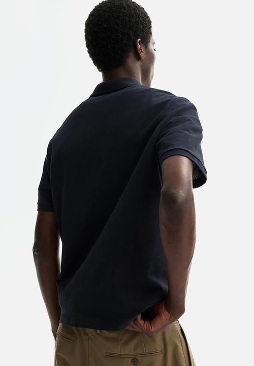 H&M - Regular fit pique polo shirt - navy blue