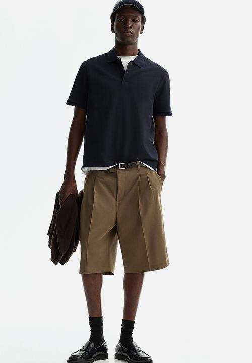 H&M - Regular fit pique polo shirt - navy blue