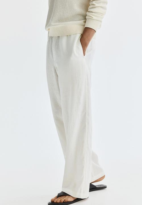H&M - Loose fit linen trousers - cream