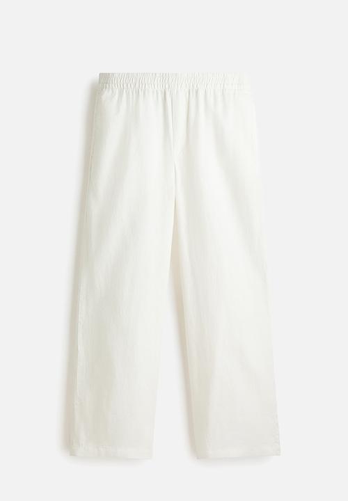 H&M - Loose fit linen trousers - cream