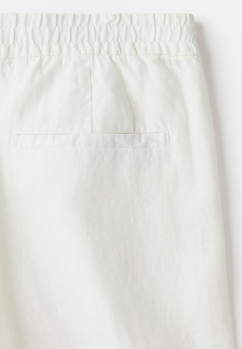 H&M - Loose fit linen trousers - cream