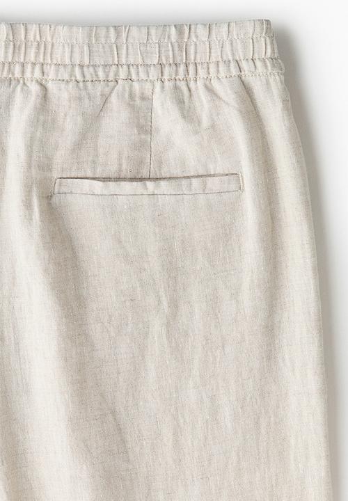 H&M - Loose fit linen trousers - light beige