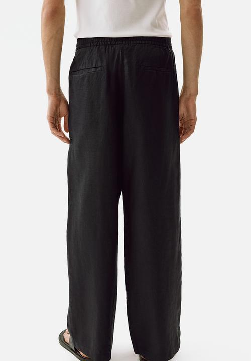 H&M - Loose fit linen trousers - black