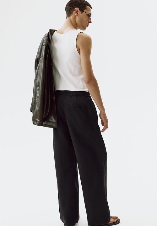 H&M - Loose fit linen trousers - black