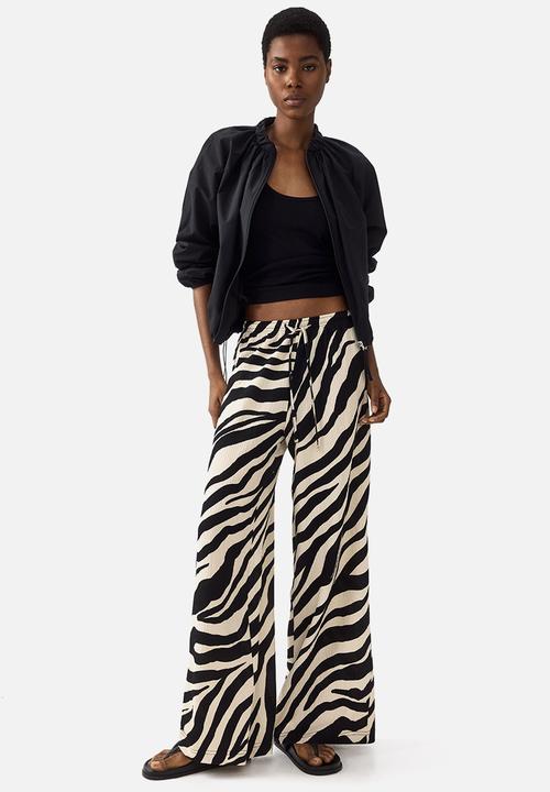 H&M - Wide pull-on trousers - black/zebra print