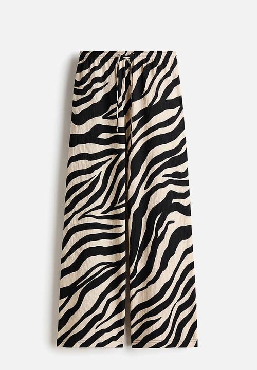 H&M - Wide pull-on trousers - black/zebra print
