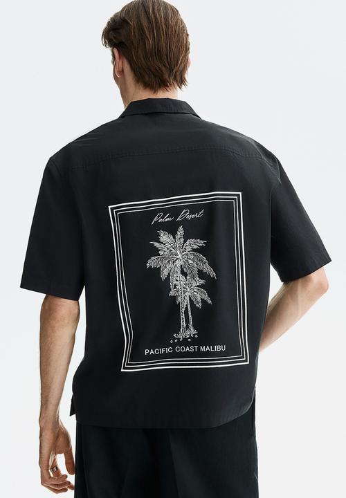 H&M - Relaxed fit printed resort shirt - black/palm desert
