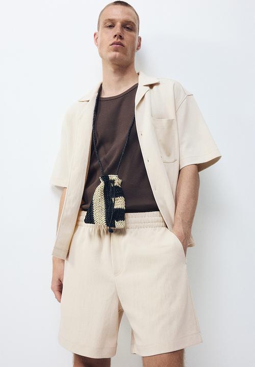 H&M - Relaxed fit interlock shorts - light beige