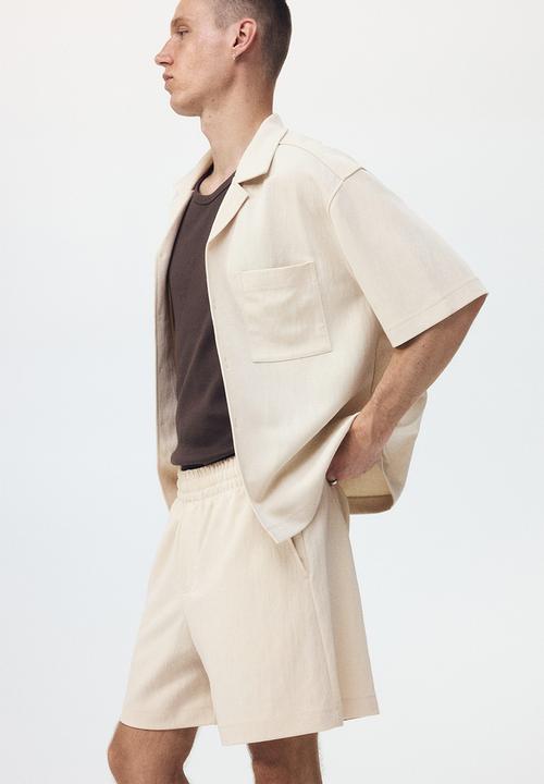 H&M - Relaxed fit interlock shorts - light beige