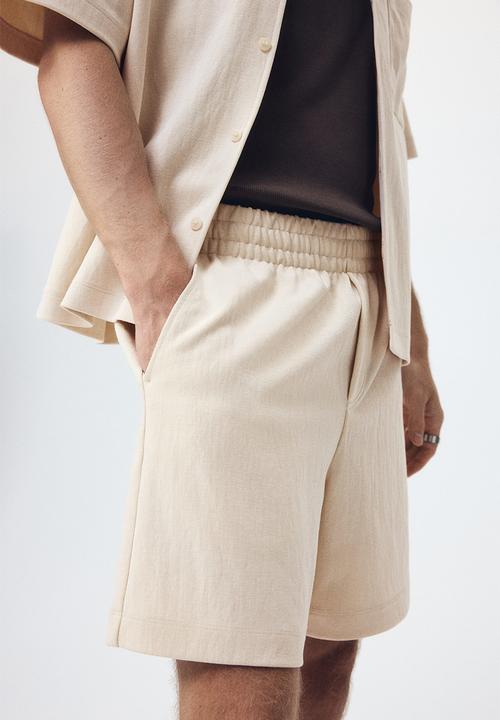 H&M - Relaxed fit interlock shorts - light beige