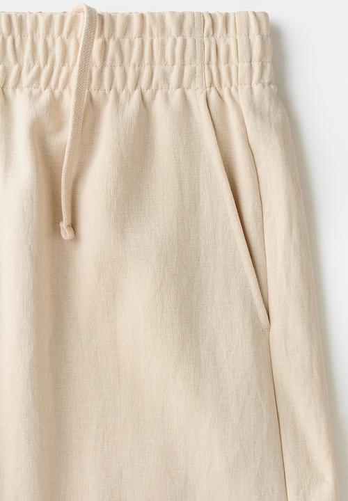 H&M - Relaxed fit interlock shorts - light beige