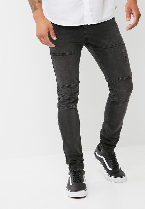 washed black biker jeans