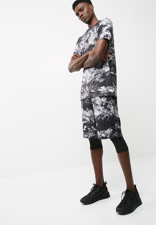 PUMA - evo Graphic Tee