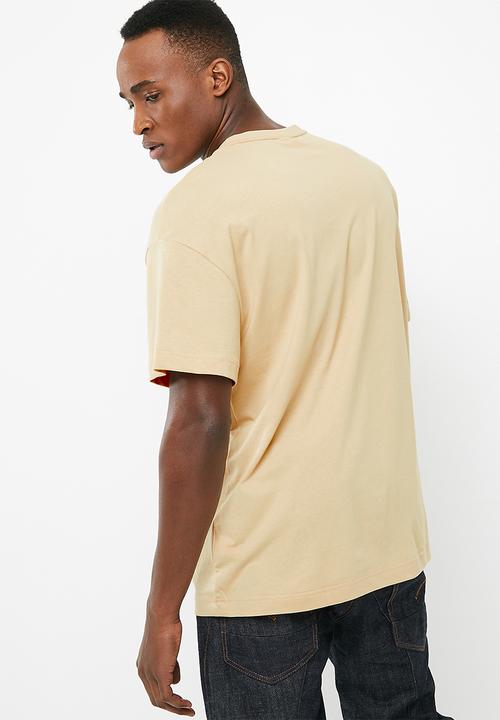 PUMA - Archive embossed print tee - beige
