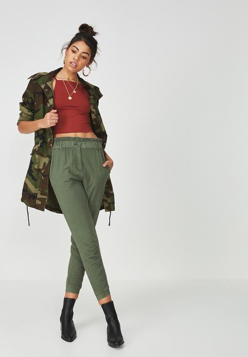 Supré  - Luxe high neck crop - rust