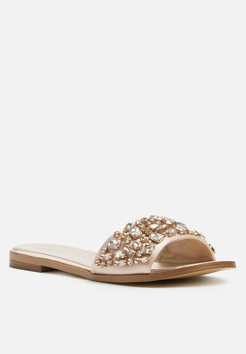 aldo gold flip flops