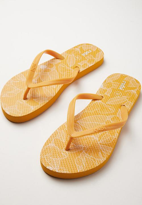 mustard flip flops