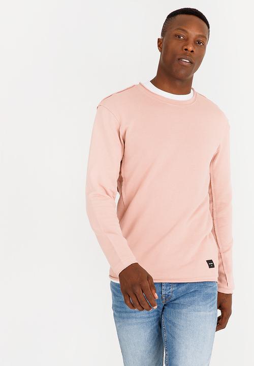 pale pink crew neck sweater