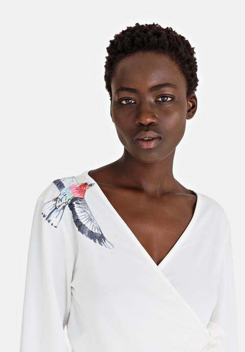 African Style Story - Wrap Blouse with Bird Applique White